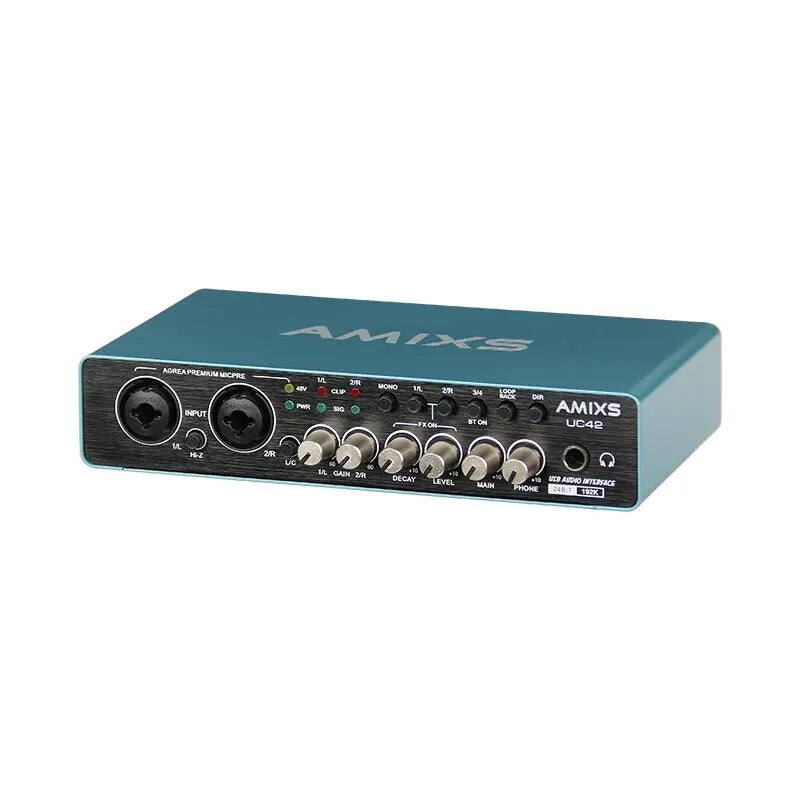 Teal amixs uc42 audio interface with black front panel and silver knobs for recording computer free and professional audio equipment