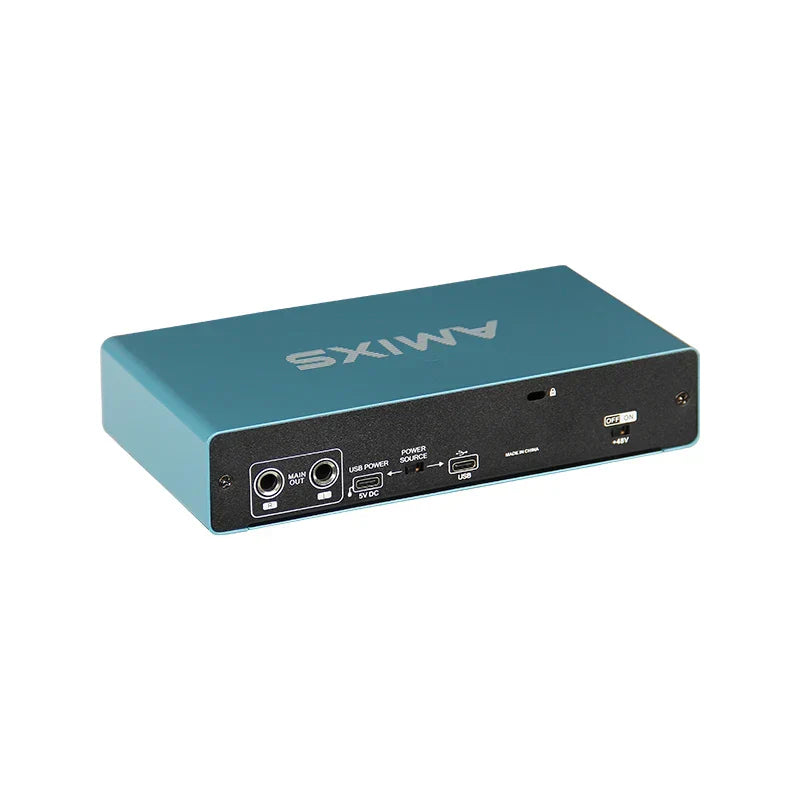 Teal amixs uc42 audio interface with black panel and multiple ports for recording computer free audio equipment professional use