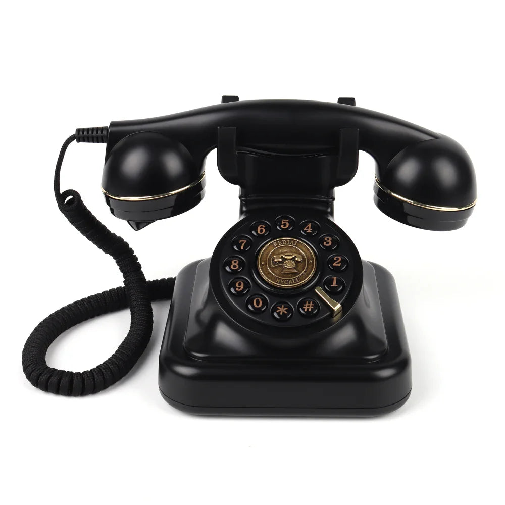 Black vintage rotary telephone with gold accents and coiled cord used as an antique wedding audio guest book device