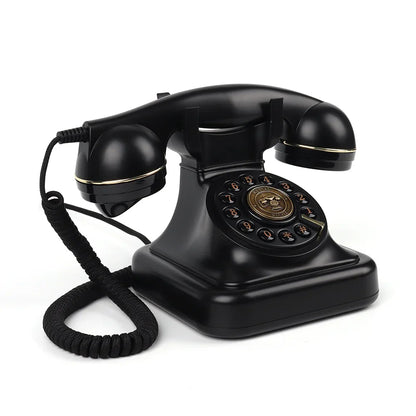 Black vintage rotary telephone with gold trim and circular dial for antique wedding audio and tape recorders message use