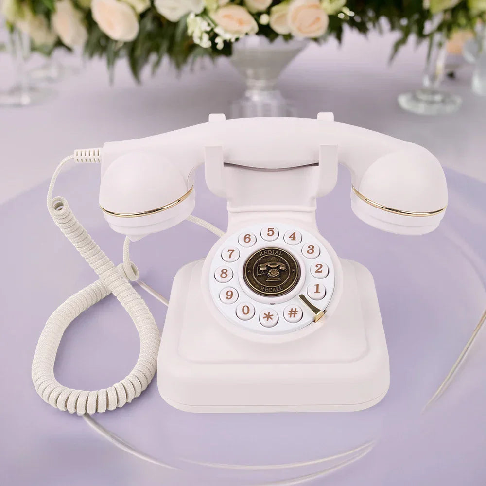White vintage rotary telephone with gold trim and circular dial for antique wedding audio guest book and tape recorders message recording