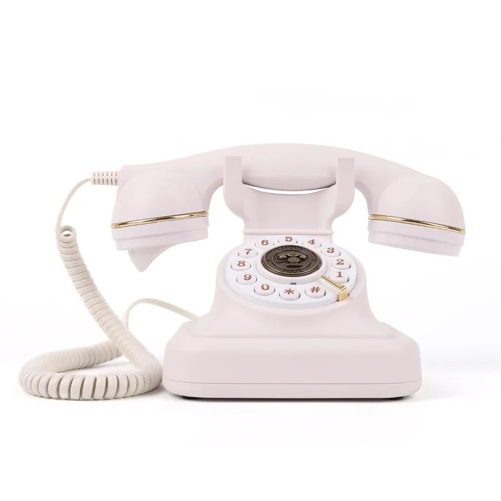 A vintage-style white rotary telephone with gold accents and coiled cord for antique wedding audio tape recorders message