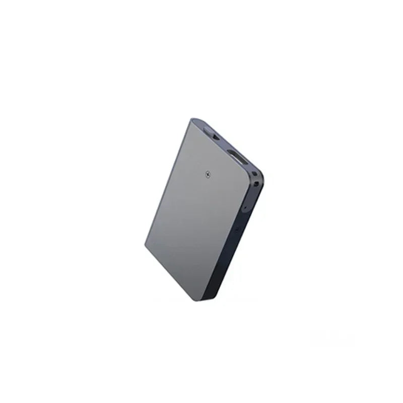 A sleek gray matte mini voice recorder with noise reduction and digital audio smart features for clear recording