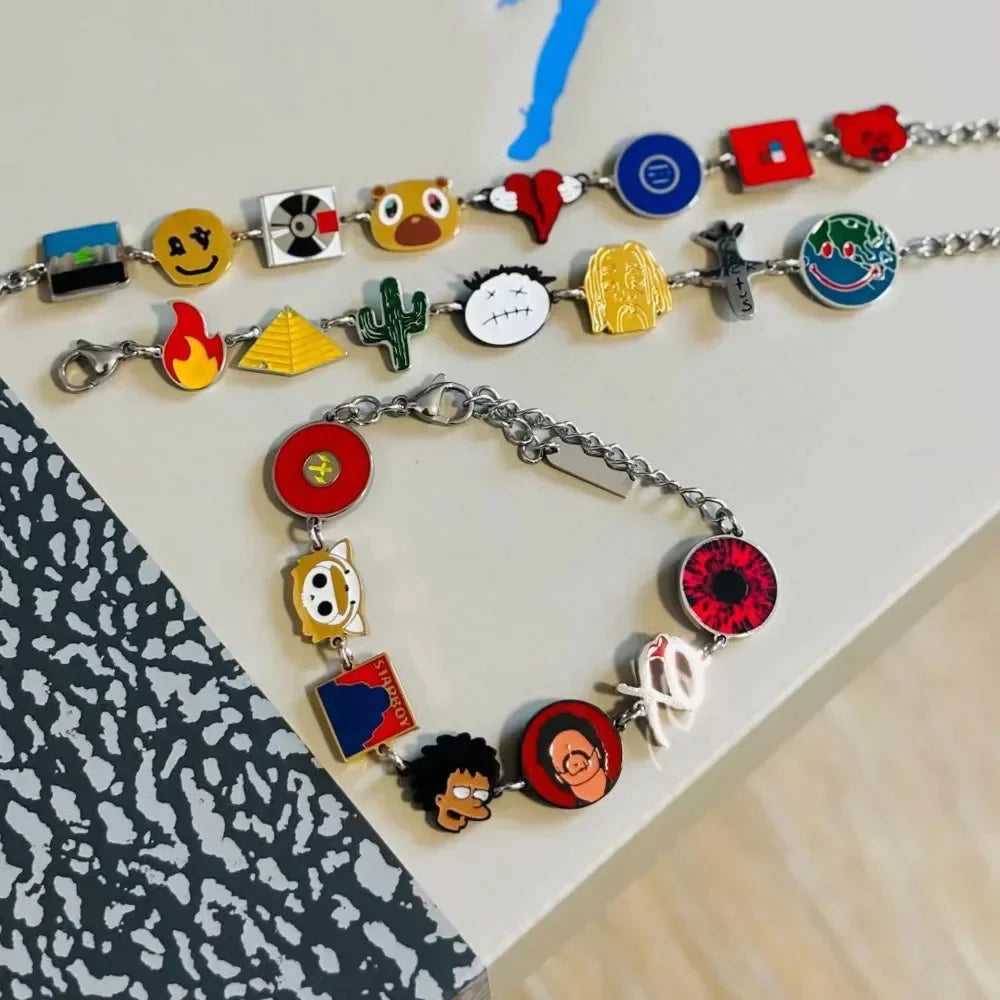 A colorful enamel charm album bracelet featuring dropouted bear vintage cartoon charms and metal cuff bangles