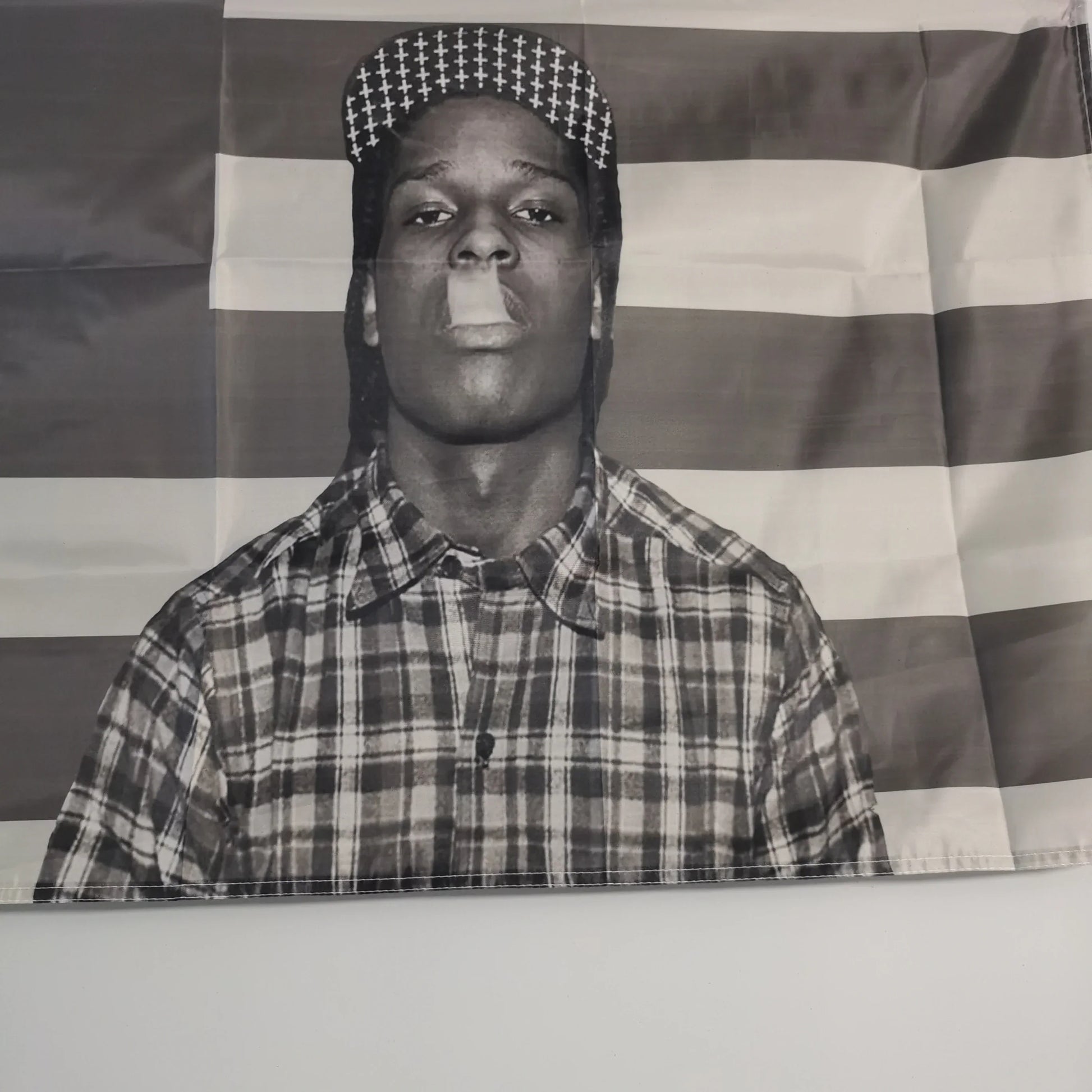 Black-and-white poster of a man in plaid shirt with mouth taped, american flag background for rockys flag 3x5fts room decor