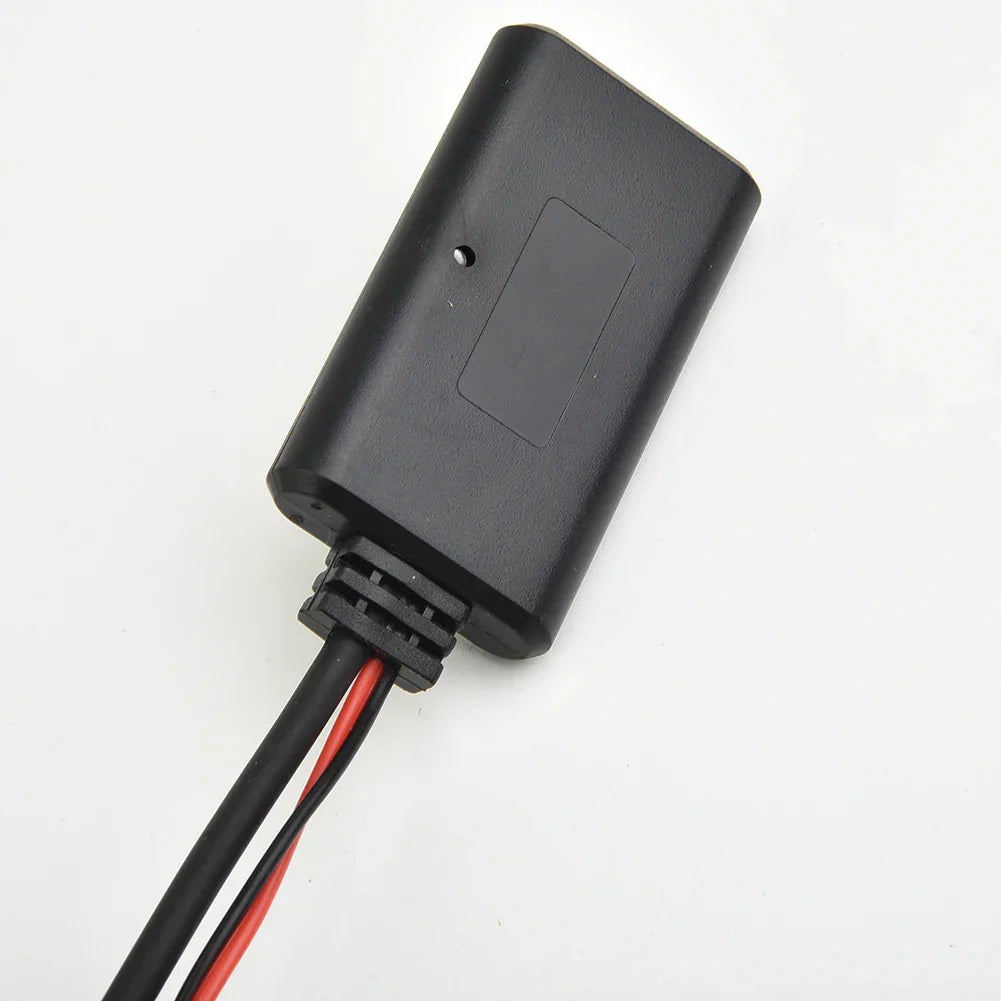 Black plastic aux cable wireless adapter with red and black wires for bmw e39 and mini r50 audio systems