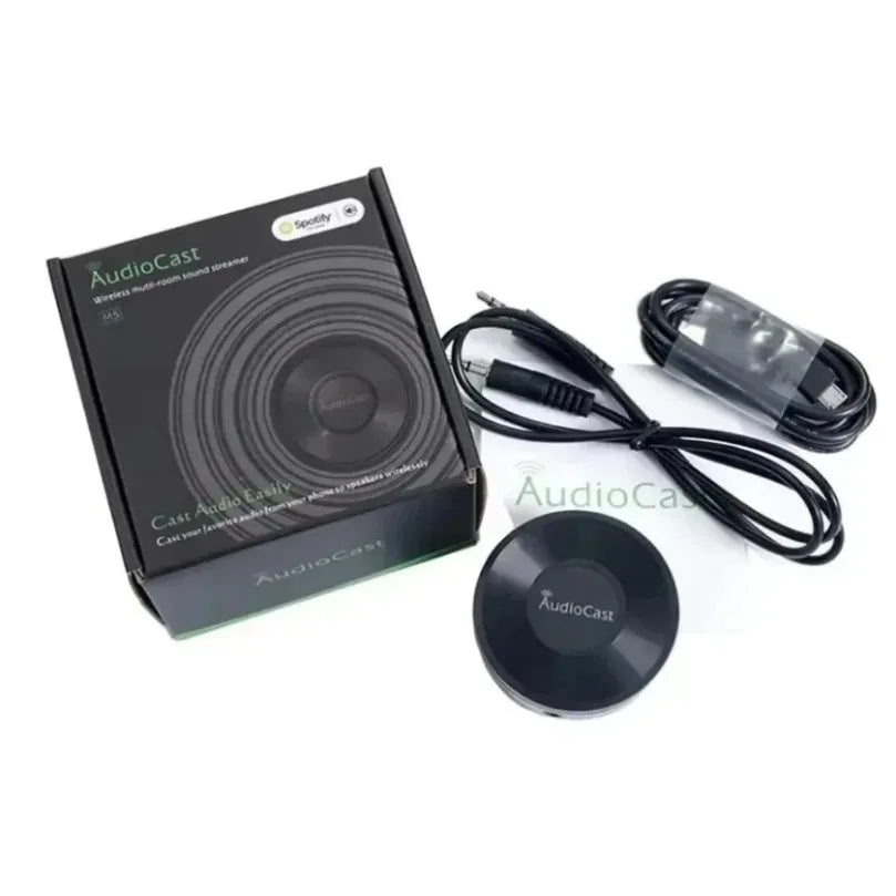 Black circular audiocast wireless multi-room sound extender with matte finish and centered logo dlna airplay adapter