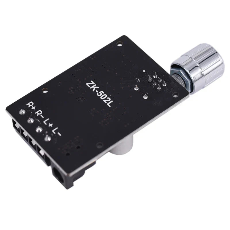 Black zk-502l high power digital amplifier stereo board with silver chrome rotary knob and labeled terminal connectors for home theater