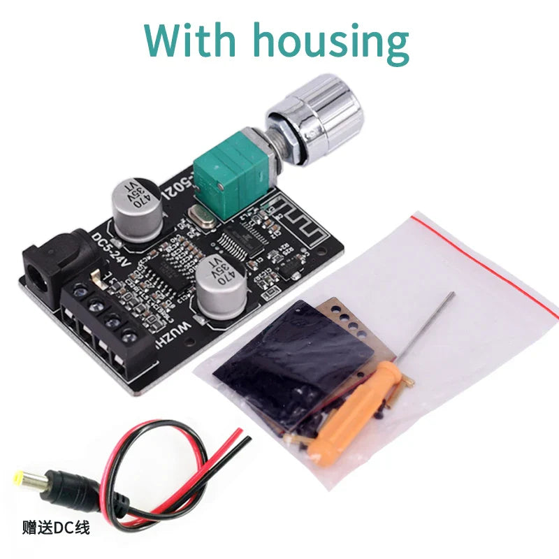 Black high power digital amplifier stereo board with silver capacitors green potentiometer and chrome output connector