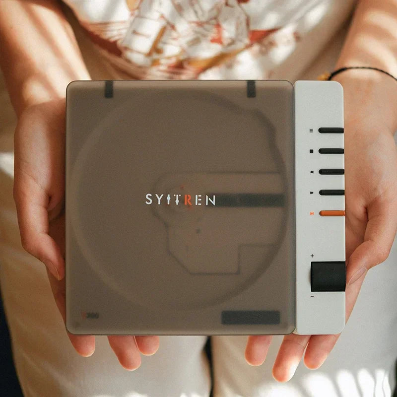 A sleek portable cd player with translucent gray body, white control panel, and quality wireless bluetooth hifi album features