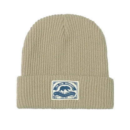 Beige ribbed knit melon cap fashion with blue and white bear patch for women hip hop punk crochet bonnet style