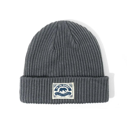 Dark gray ribbed knit beanie with folded cuff and bear patch perfect for women hip hop punk crochet bonnet melon cap fashion