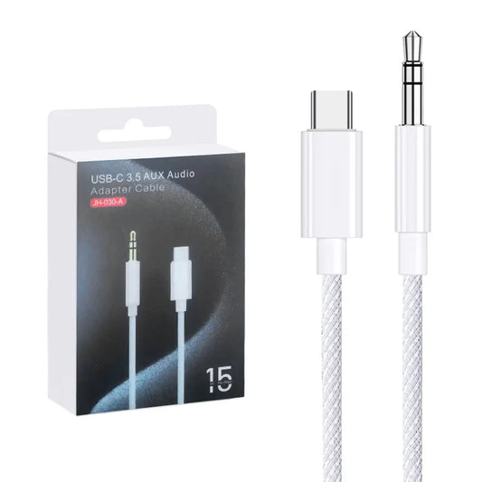 White usb-c to 3.5mm jack aux cord with braided silver and white exterior for speaker headphones adapter use