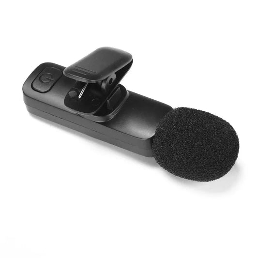 Black clip-on wireless lavalier microphone with foam wind cover microphone antipop for studio recording and podcasting