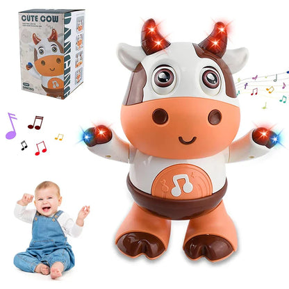 Cute orange and white baby dancing cow electric music plush with glowing horns and moves baby interactive features