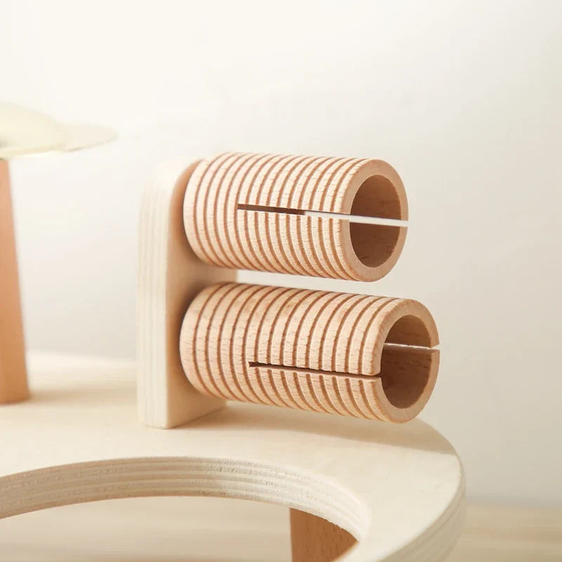 Light-colored wooden cylindrical holders with grooves and split design for aeolian bells montessori musical toys xylophone newborn birthday gifts