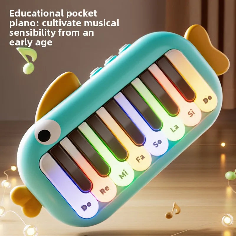 Turquoise fish-shaped baby music instrument with colorful illuminated keys for toy learning educational use