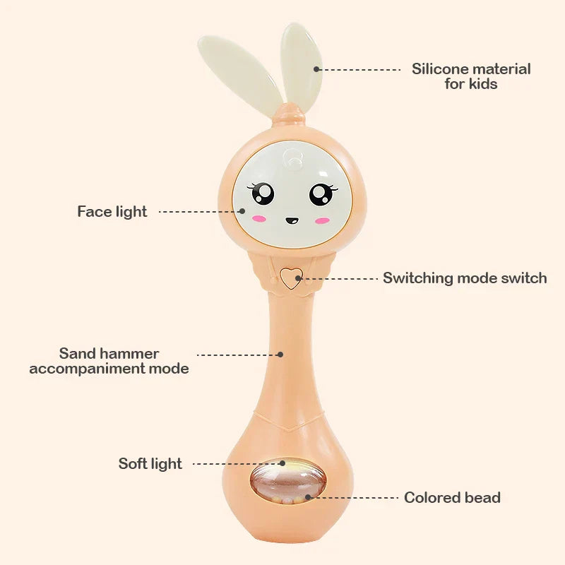 Pastel peach silicone baby music teether rattle with bunny ears smiling face light for education mobile cot and crib infant pacifier