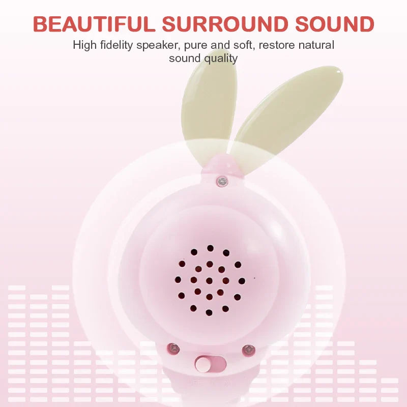 Pink bunny-shaped baby music teether speaker with light green ears and black grille for education mobile cot and crib infant pacifier use