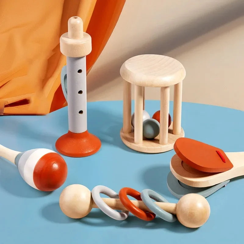 Wooden baby rattle with colorful rings and spheres as educational toys birthday gift and child percussion instruments