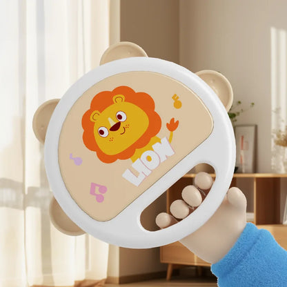 White plastic baby tambourine with cheerful lion design and pink musical notes for hand development interactive drum toys montessori