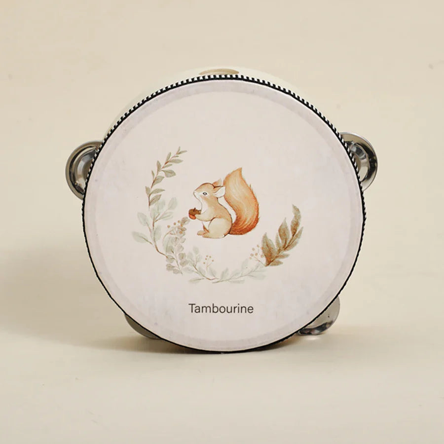 White tambourine baby musical toy with squirrel illustration black trim metallic jingles educational instrument plaything
