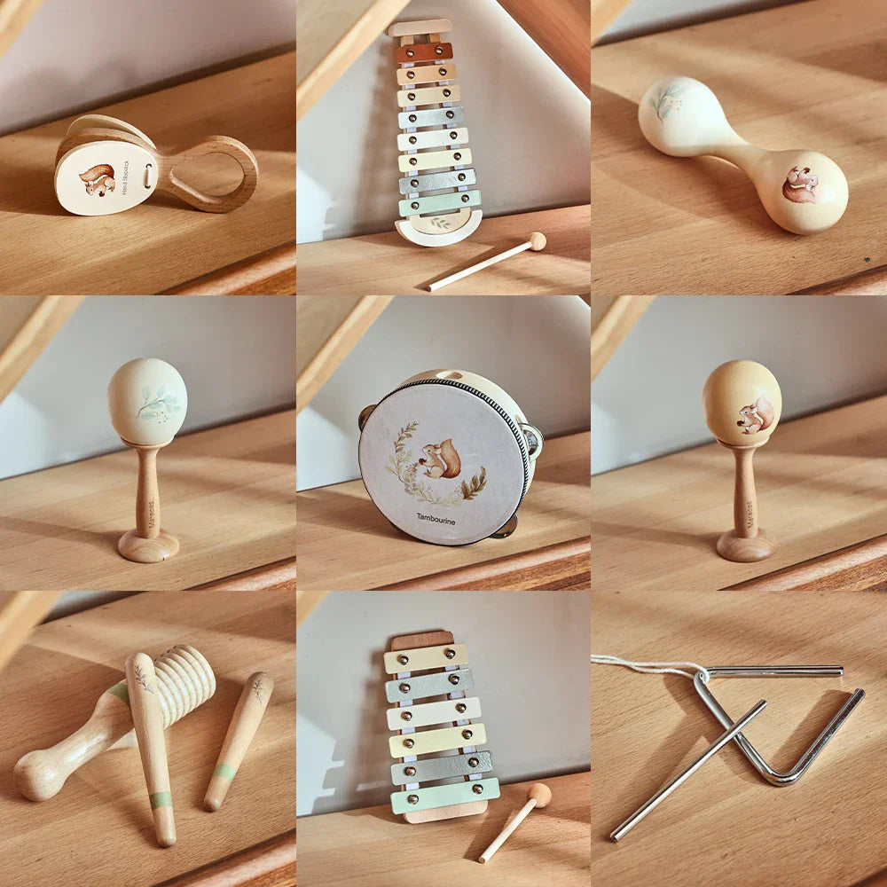 Wooden xylophone with pastel-colored keys and natural frame as baby musical toys and educational instrument playthings