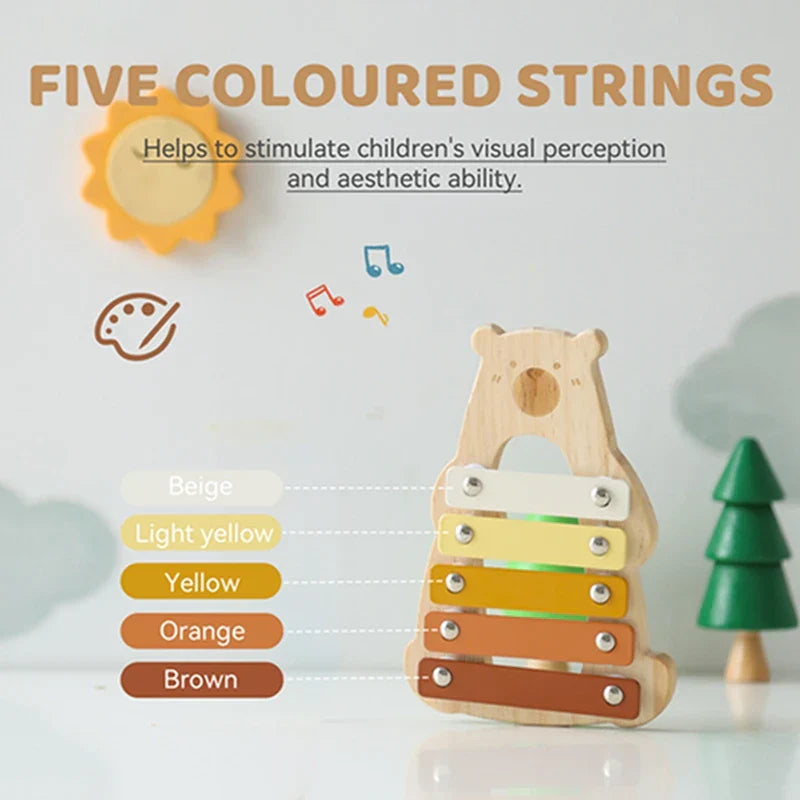 A wooden baby percussion music toy featuring five colored strings in beige, yellow, orange, and brown for early education