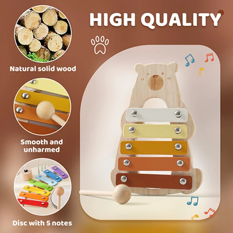 A wooden baby percussion toy shaped like a bear with five colorful bars and silver metal fasteners for musical early education