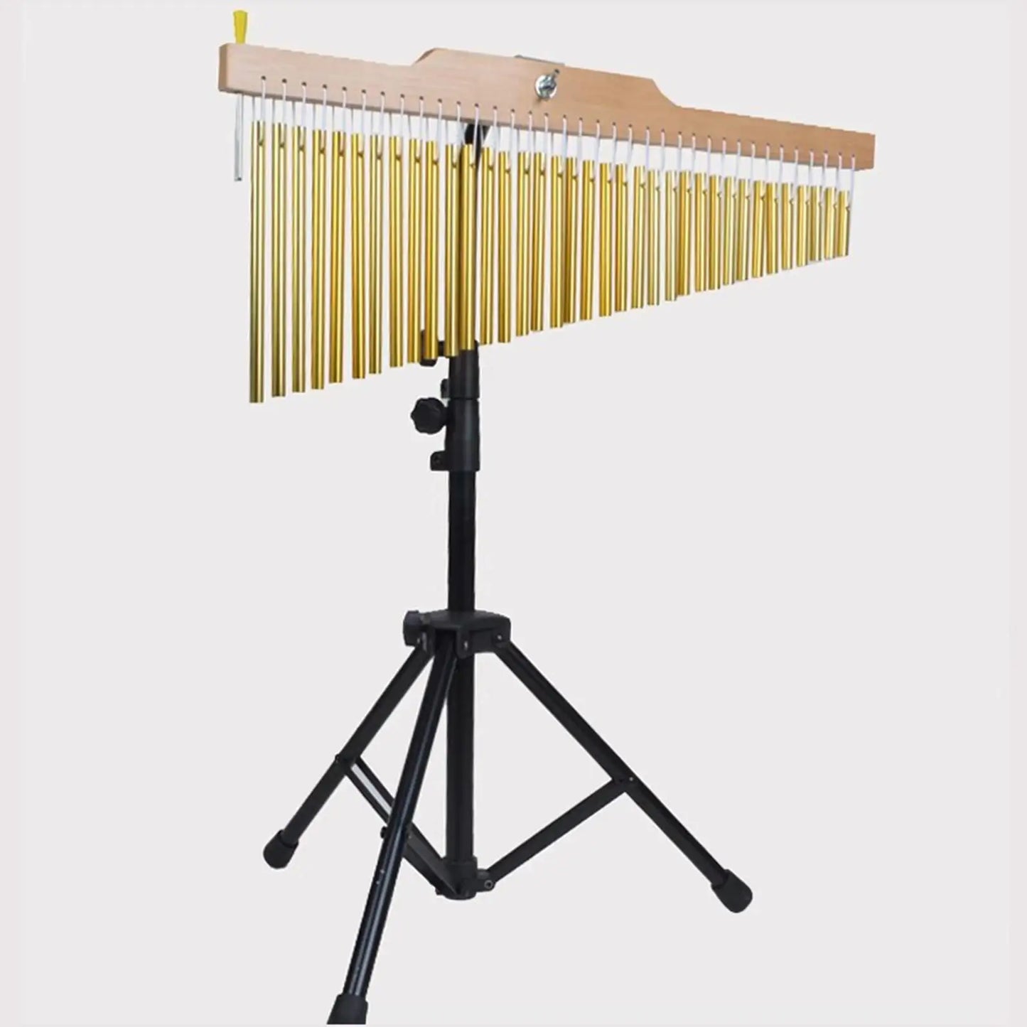 Golden brass bar chimes arranged in a graduated row on a wooden frame with a height adjustable chimes tripod stand percussion