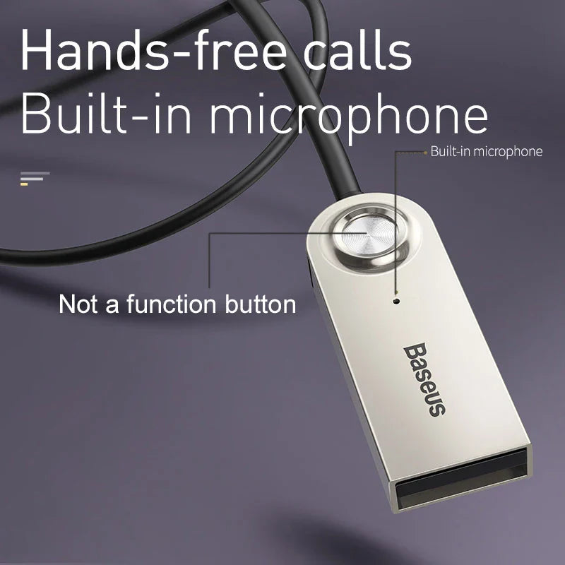 Silver metallic baseus aux bluetooth dongle cable handfree with built-in microphone and sleek rectangular design