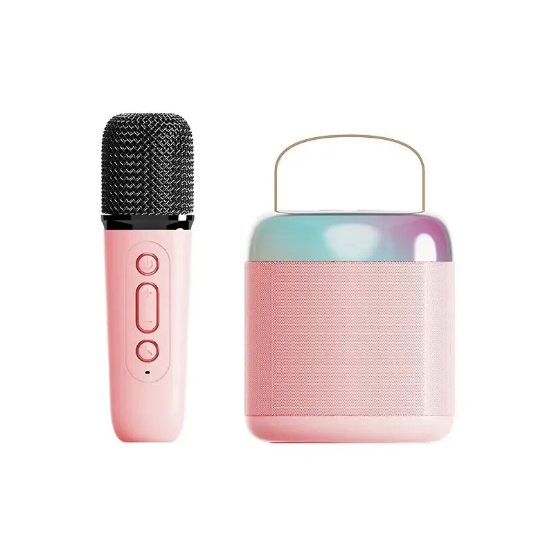 Pink basix speaker microphone with black mesh grille and rainbow gradient top portable spe soundspeaker for karaoke family wireless use