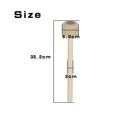 Beige bass drum mallet with wool felt head and smooth wood handle for percussion and snare drum use