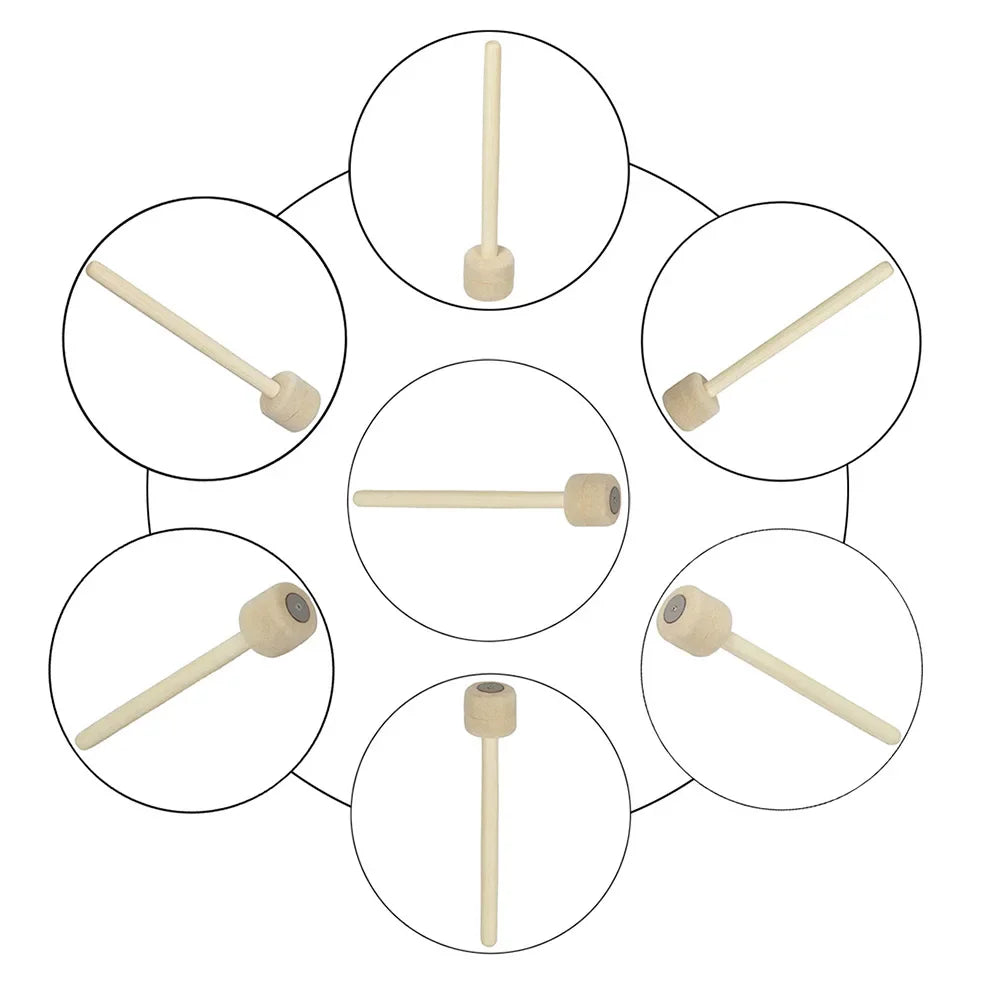 Set of seven bass drum mallets with wood handle and light-colored wool felt heads for percussion instruments