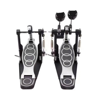 Black and silver double drum pedal with circular grip patterns on zinc aluminum footplates for stable powerful play