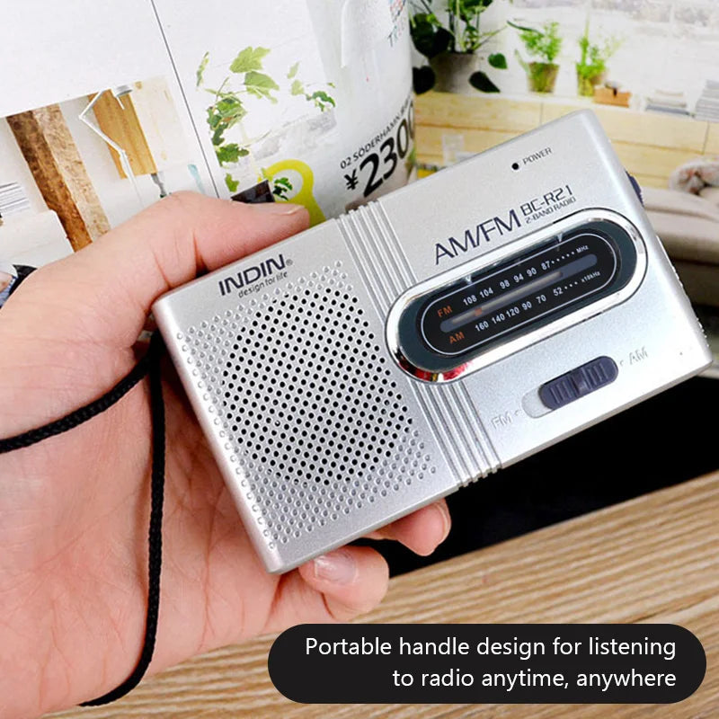 Silver bc-r21 portable am fm receiver player built-in speaker with perforated grille and chrome-accented dial for headphones handheld lightweight ultra use