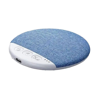 Circular blue denim-textured wireless charger with white plastic edge and control buttons for bedside sleep aid speaker professional harman tuning