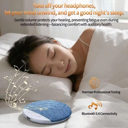 Blue textured circular bedside sleep aid speaker with white base professional harman tuning for gentle volume protection