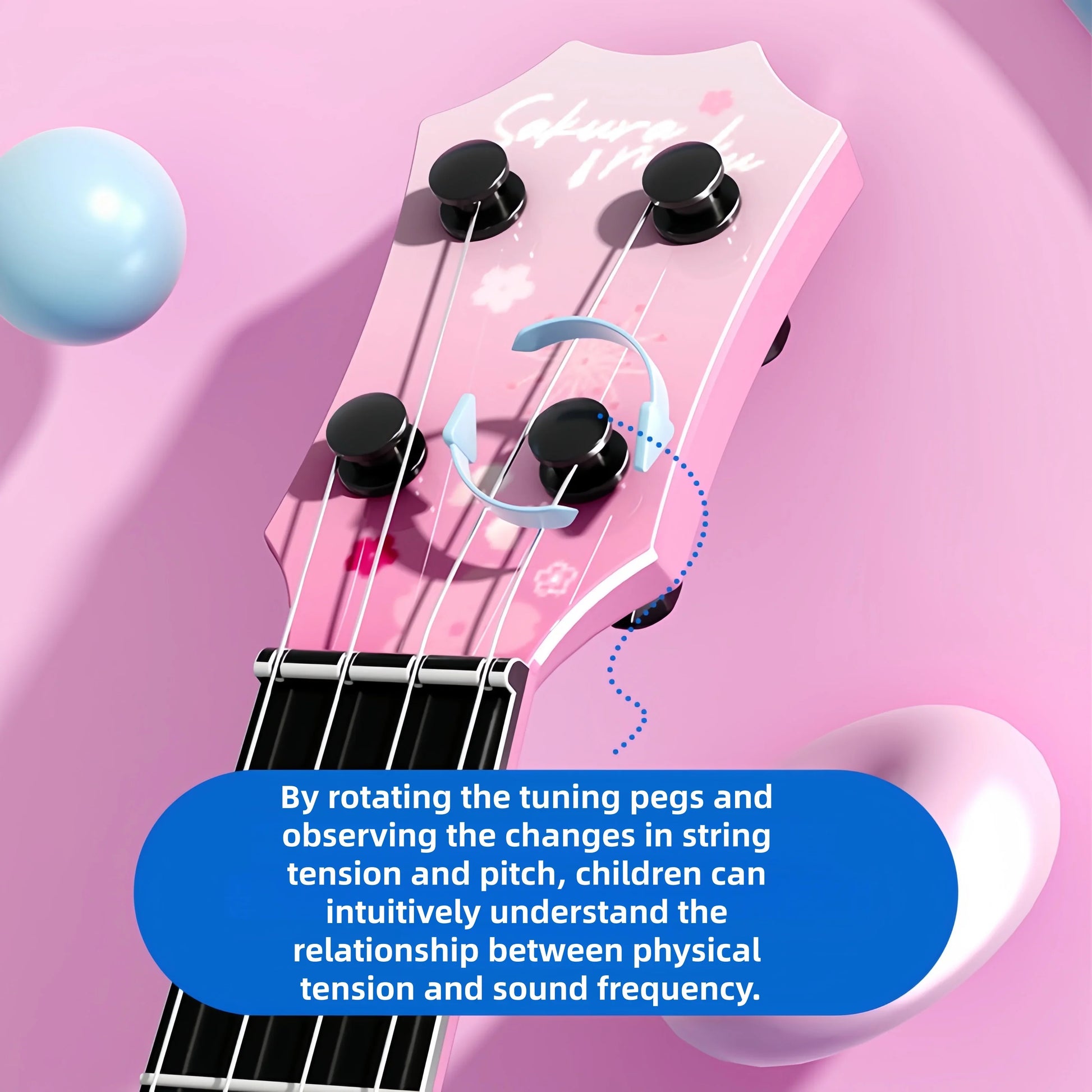 Beginner’s guitar ukulele pink sakura themed with black tuning pegs and white string tension tool for students