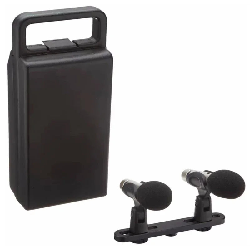 Black plastic carrying case with handle and two behringer c-2 matched condenser microphones with cardioid pickup pattern for stereo studio recording