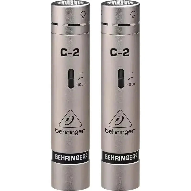 A pair of silver behringer c-2 matched condenser microphones with cardioid pickup pattern for stereo studio recording