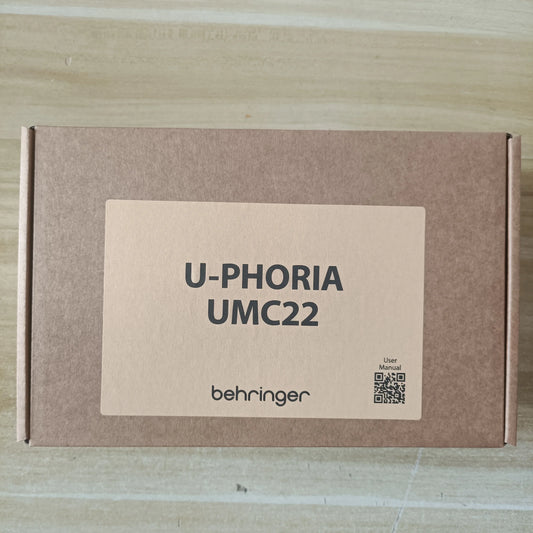 Brown cardboard box packaging for behringer umc22 um2 audio interface microphone headphone amplifier sound card