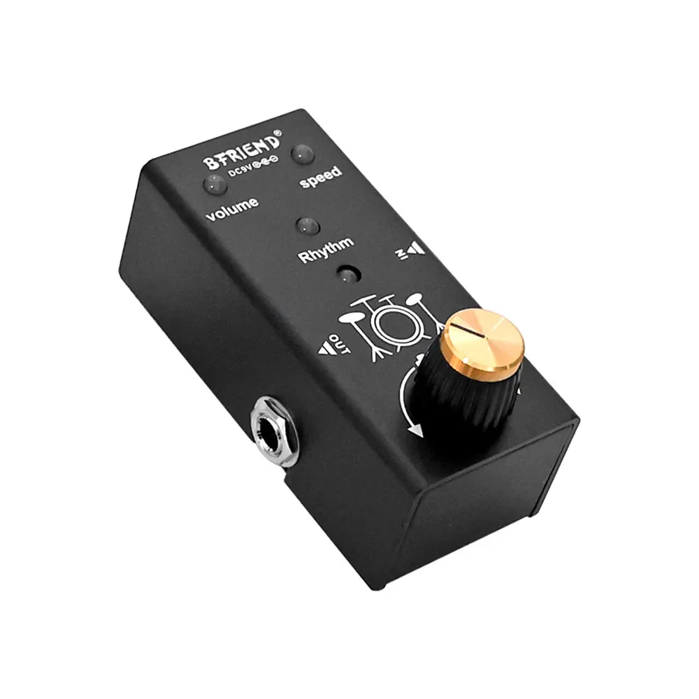 Black B-friend dcv drum machine accompaniment pedal with gold knob and silver input jack for electric guitar acoustic use