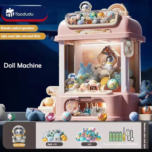 Pink plastic diy doll machine with kids coin operated mini claw catch feature containing astronaut plush toys and glass balls