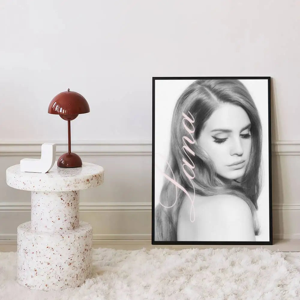 Black framed black and white lana del rey classic movie poster with white cursive name for nordic home decor size reference