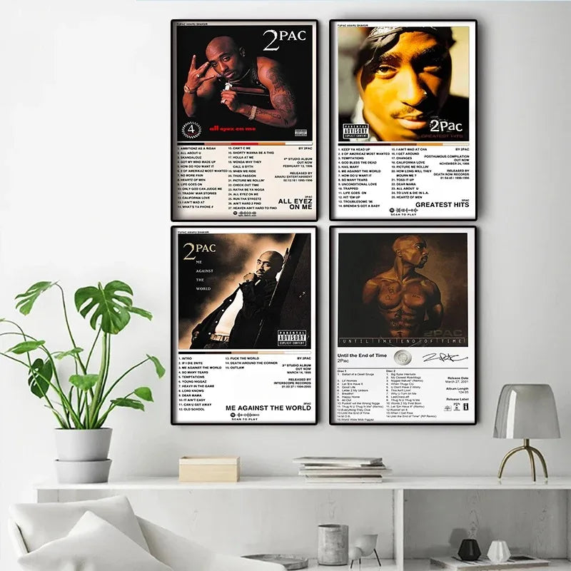 Four framed black and white and sepia toned 2pac album poster prints arranged on white wall for room decor with business days shipping