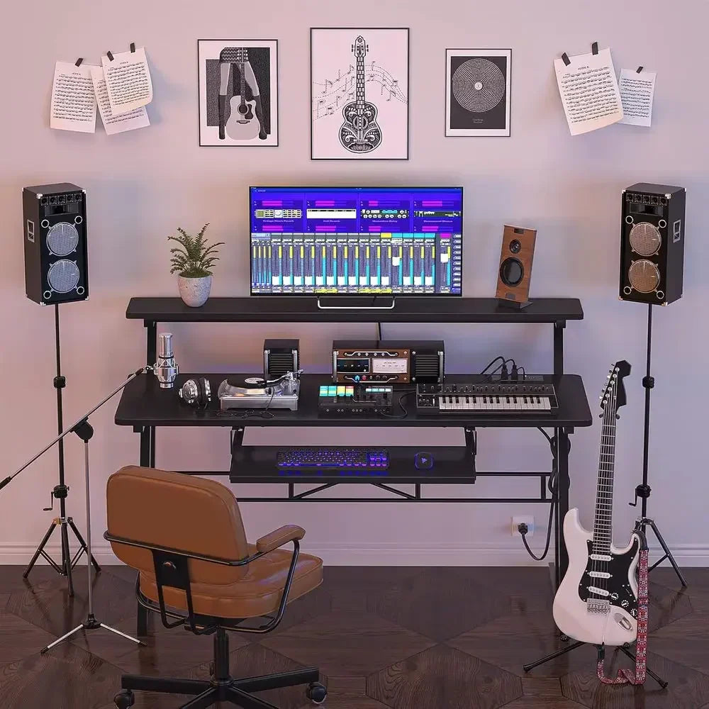 Black metal music production desk with power outlet featuring audio equipment and glowing keyboard for type beat music