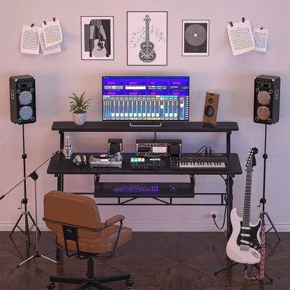 Black metal music production desk with power outlet featuring audio equipment and glowing keyboard for type beat music