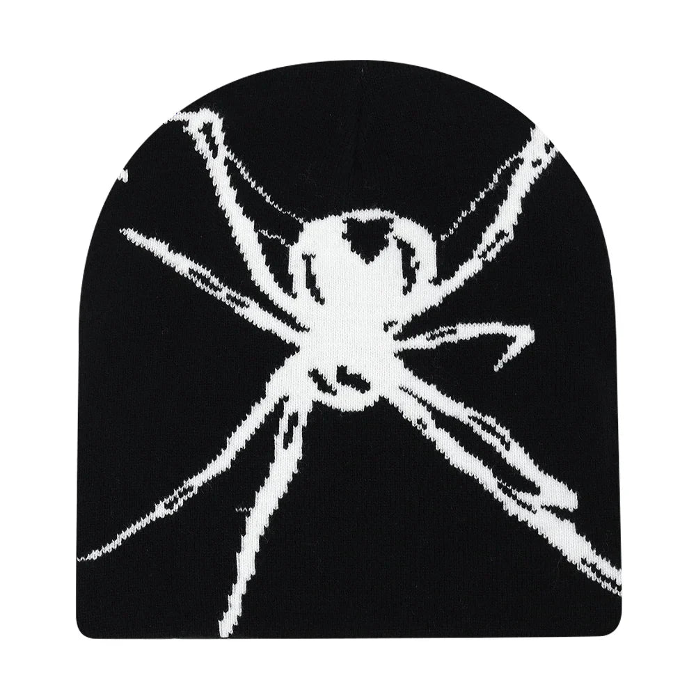 Black knit hat featuring a bold white spider design in knit material ideal for warm beanies women and skiing beanie outdoor use
