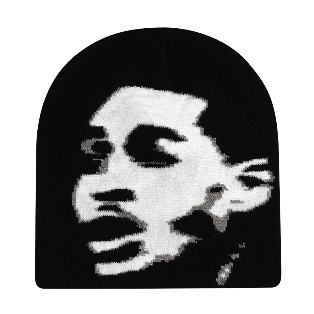 Black knit hat featuring a bold white pixelated portrait designed as a warm beanie for women and skiing beanie outdoor use